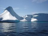 [Photo of iceberg]