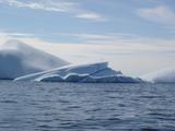 [Photo of iceberg]