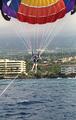 [Photo of Liam parasailing]