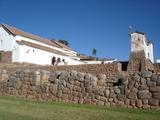 [Photo of church on Incan ruins]